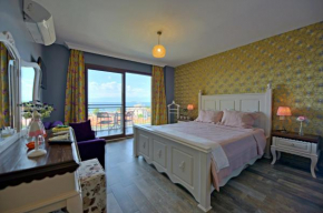 Отель Nilüfer Butik Otel  Айвалык